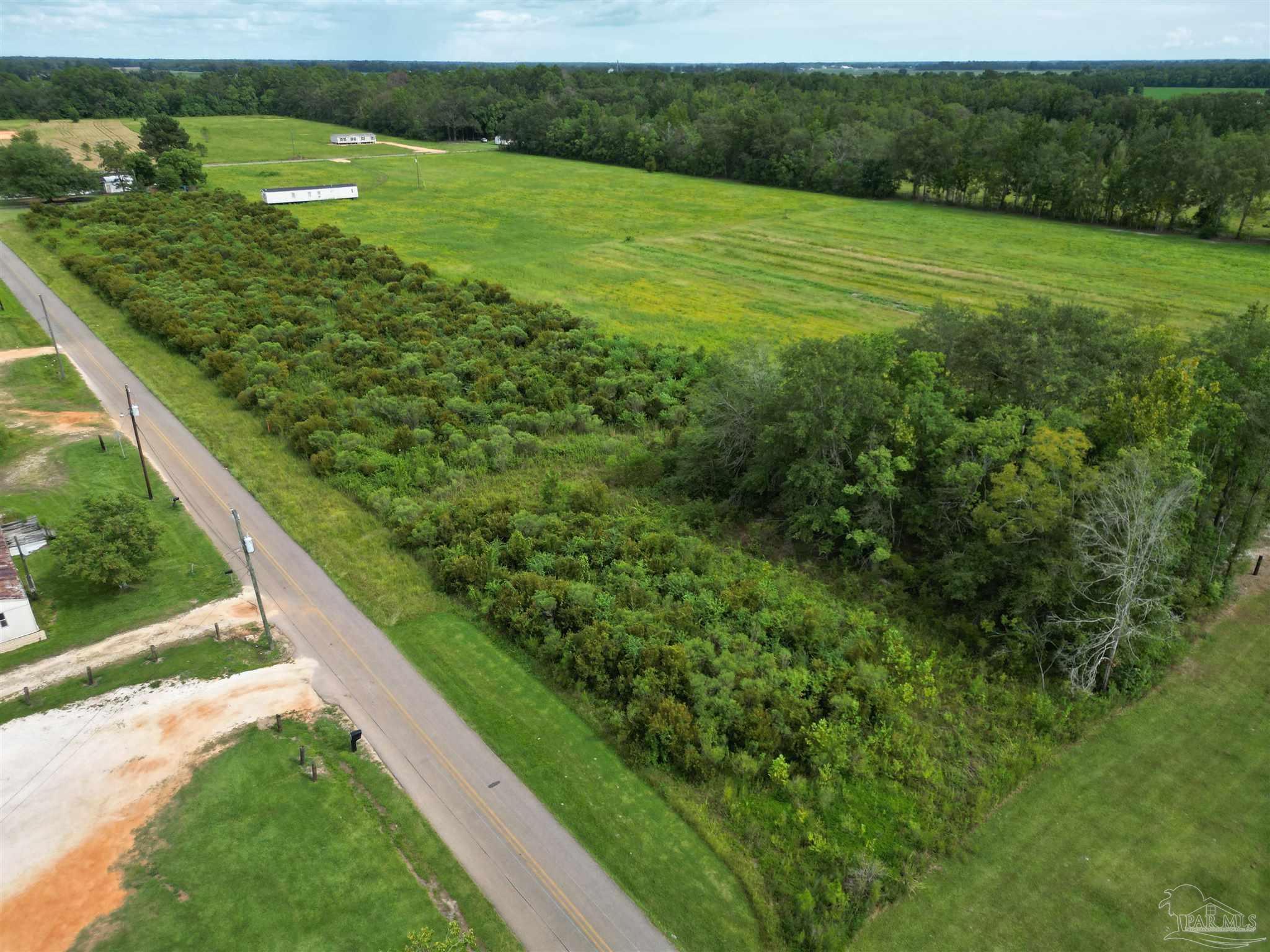 3 Northgate Drive Atmore, AL 36502 - Photo 2 of 8 a view of a field with an ocean view