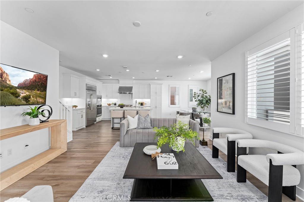 22 Transport Tustin, CA 92782 - Photo 1 of 44 a living room with furniture and a flat screen tv