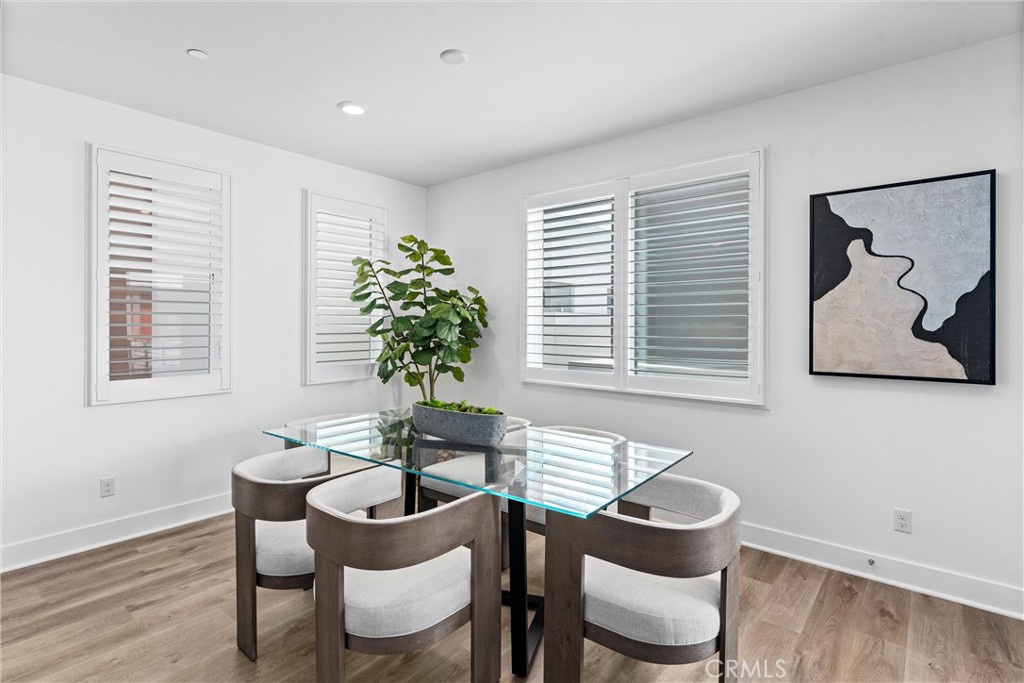 22 Transport Tustin, CA 92782 - Photo 12 of 44 a dining room with furniture and window