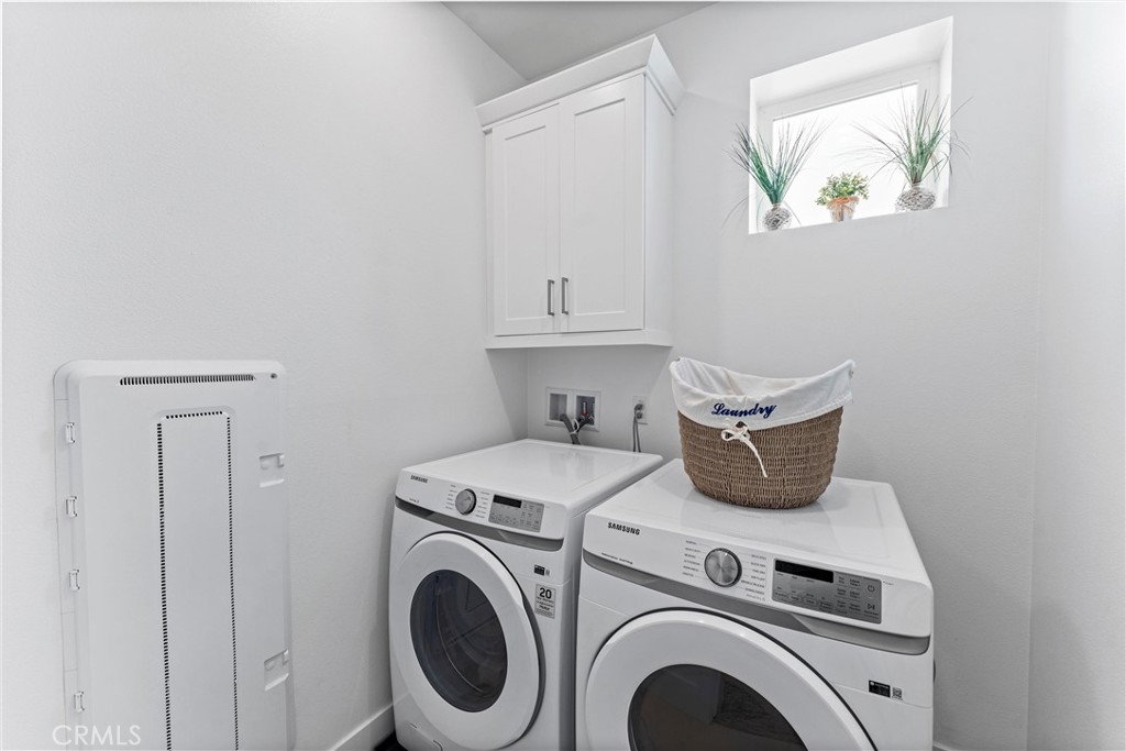 22 Transport Tustin, CA 92782 - Photo 26 of 44 a view of washer and dryer in a utility room
