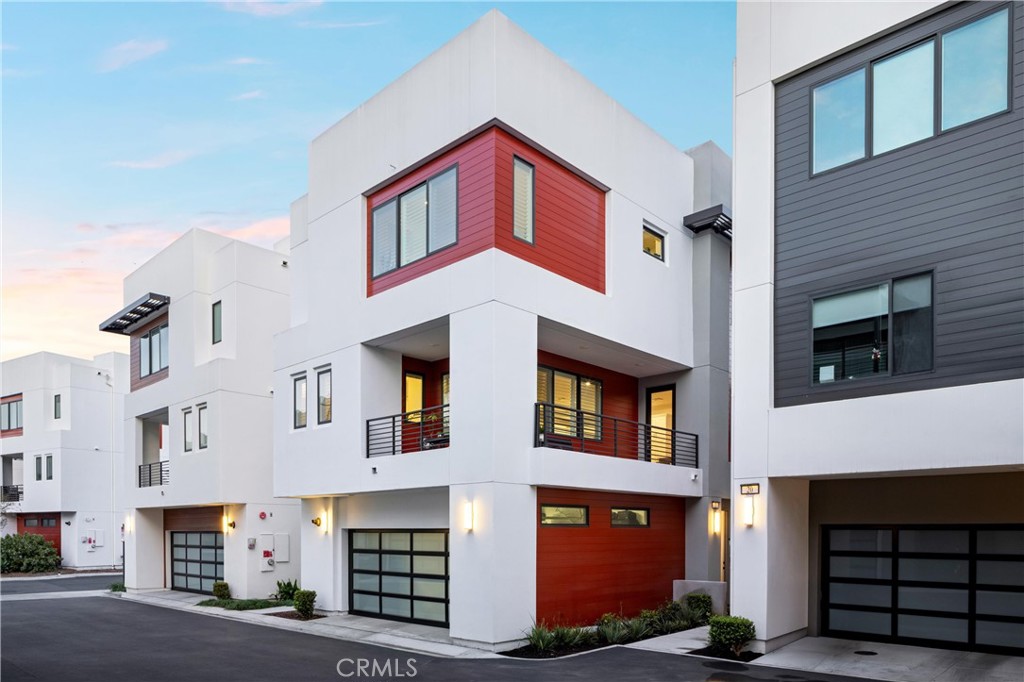 22 Transport Tustin, CA 92782 - Photo 34 of 44 a front view of a house with a garage