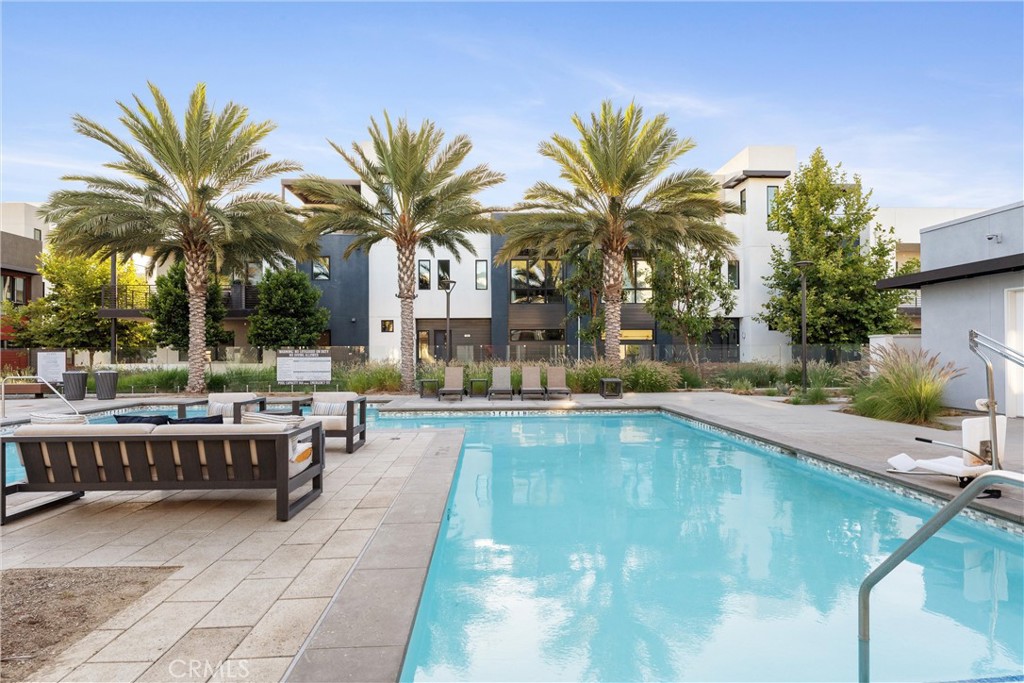 22 Transport Tustin, CA 92782 - Photo 42 of 44 a view of swimming pool with outdoor seating and plants