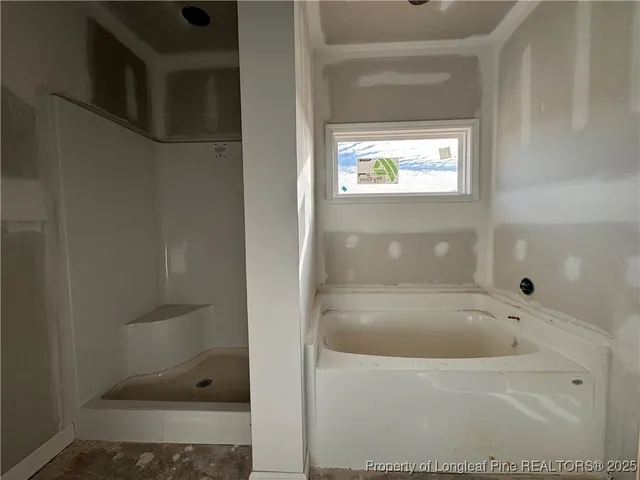 a kitchen with stainless steel appliances a sink stove and cabinets