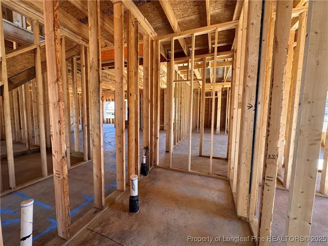 a view of empty room with floor to ceiling window