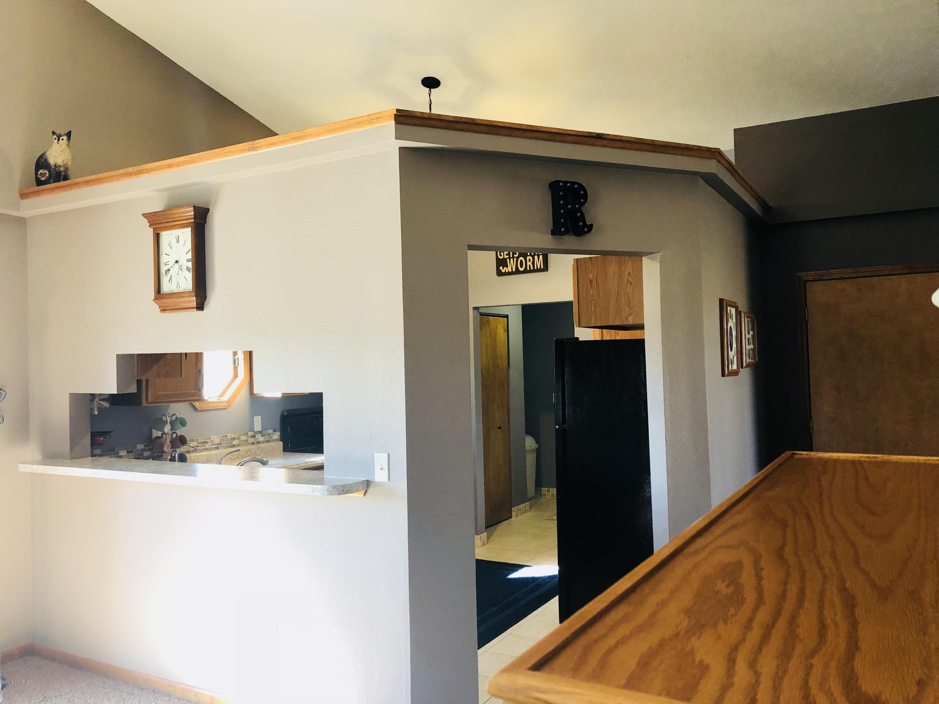 65 West Long Lake Road Orleans, MI 48865 - Photo 3 of 36 1E7A33B9-7FBB-48CD-8351-FD703DA2C022