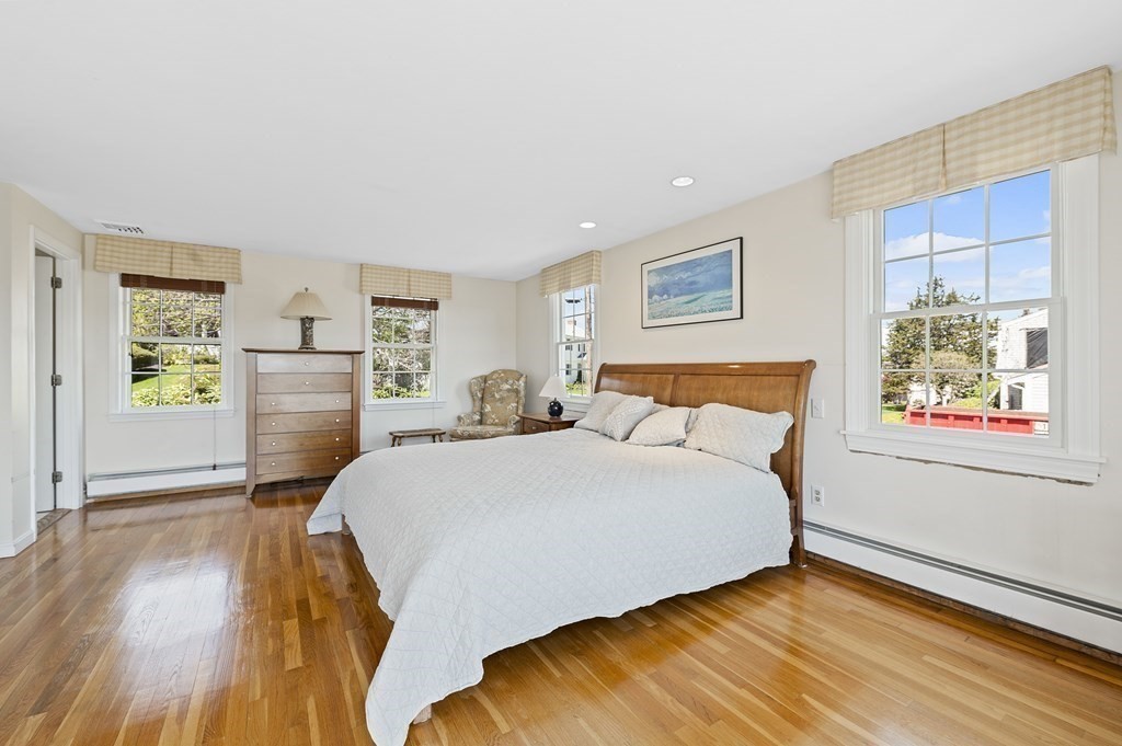 38 Crestwood Road Marblehead, MA 01945 - Photo 13 of 28 a spacious bedroom with a bed and a cabinets