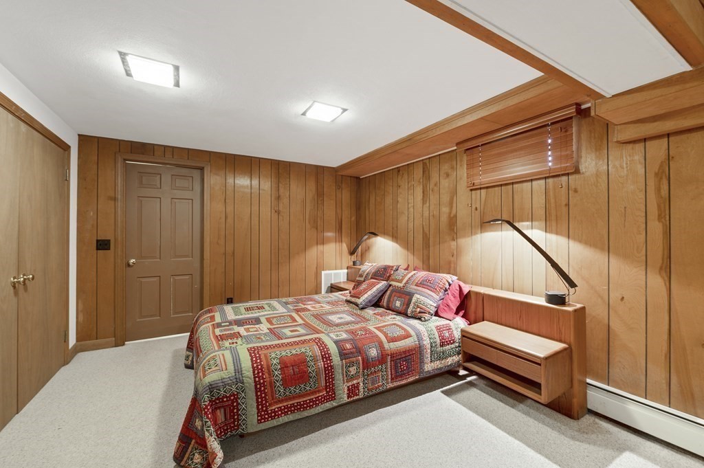 38 Crestwood Road Marblehead, MA 01945 - Photo 21 of 28 a bedroom with a bed and a cabinets