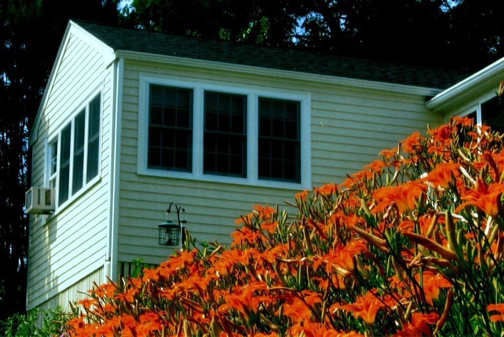 38 Crestwood Road Marblehead, MA 01945 - Photo 27 of 28 a front view of a house with a yard