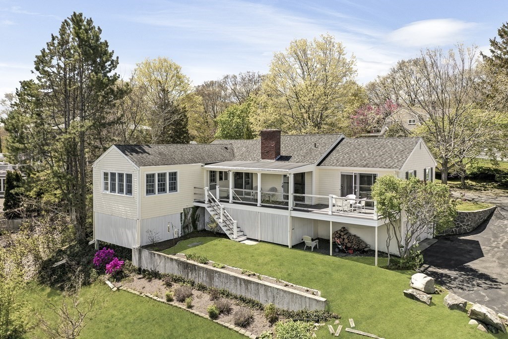 38 Crestwood Road Marblehead, MA 01945 - Photo 3 of 28 a front view of a house with a garden