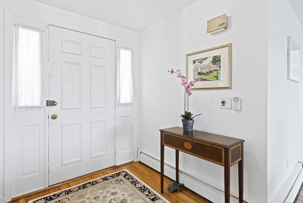 38 Crestwood Road Marblehead, MA 01945 - Photo 4 of 28 a view of a room with a potted plant on a dresser