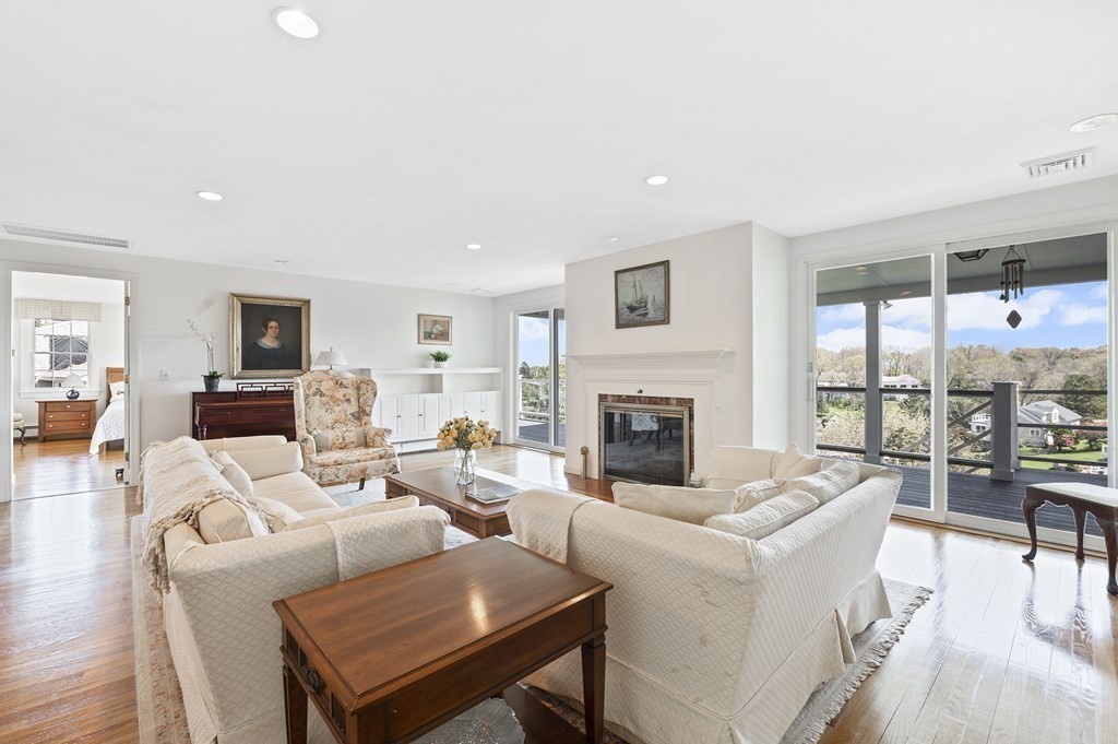 38 Crestwood Road Marblehead, MA 01945 - Photo 7 of 28 a living room with furniture fireplace and a large window