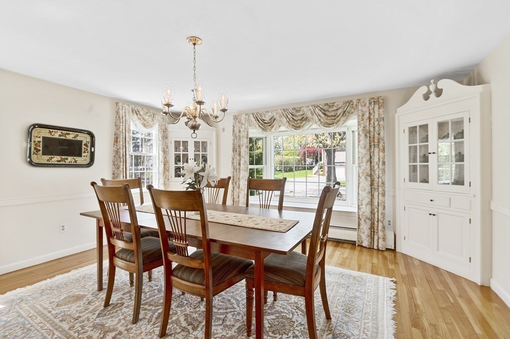 38 Crestwood Road Marblehead, MA 01945 - Photo 9 of 28 a view of a dining room with furniture window and wooden floor