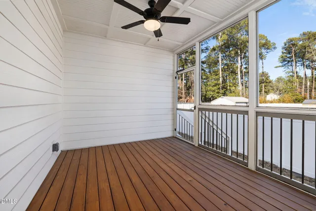 a room with a bed and a window
