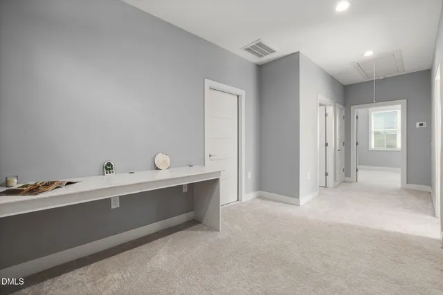 a view of a closet with storage