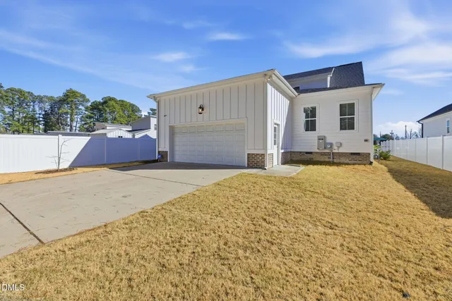 a house view with a backyard space