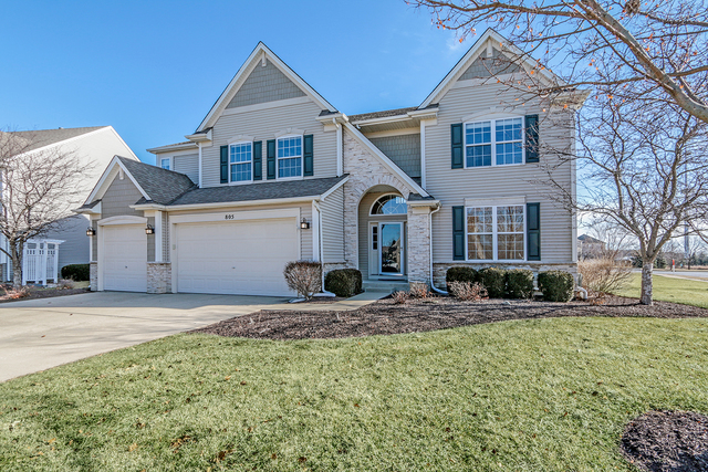 805 Myers Road Sugar Grove, IL 60554 - Photo 1 of 27 a front view of a house with a yard