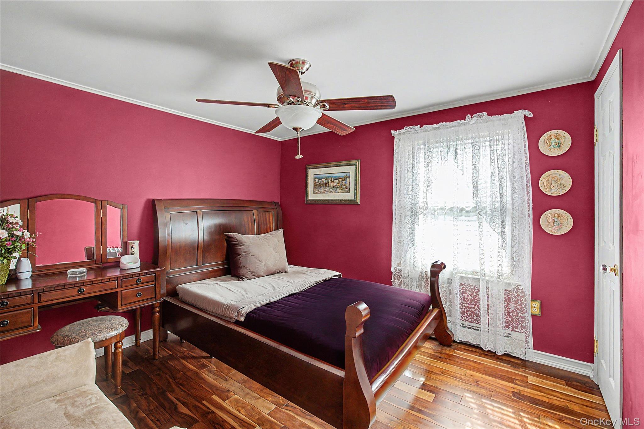 9 South Pond Trail Ridge, NY 11961 - Photo 37 of 40 a bedroom with a bed and a lamp