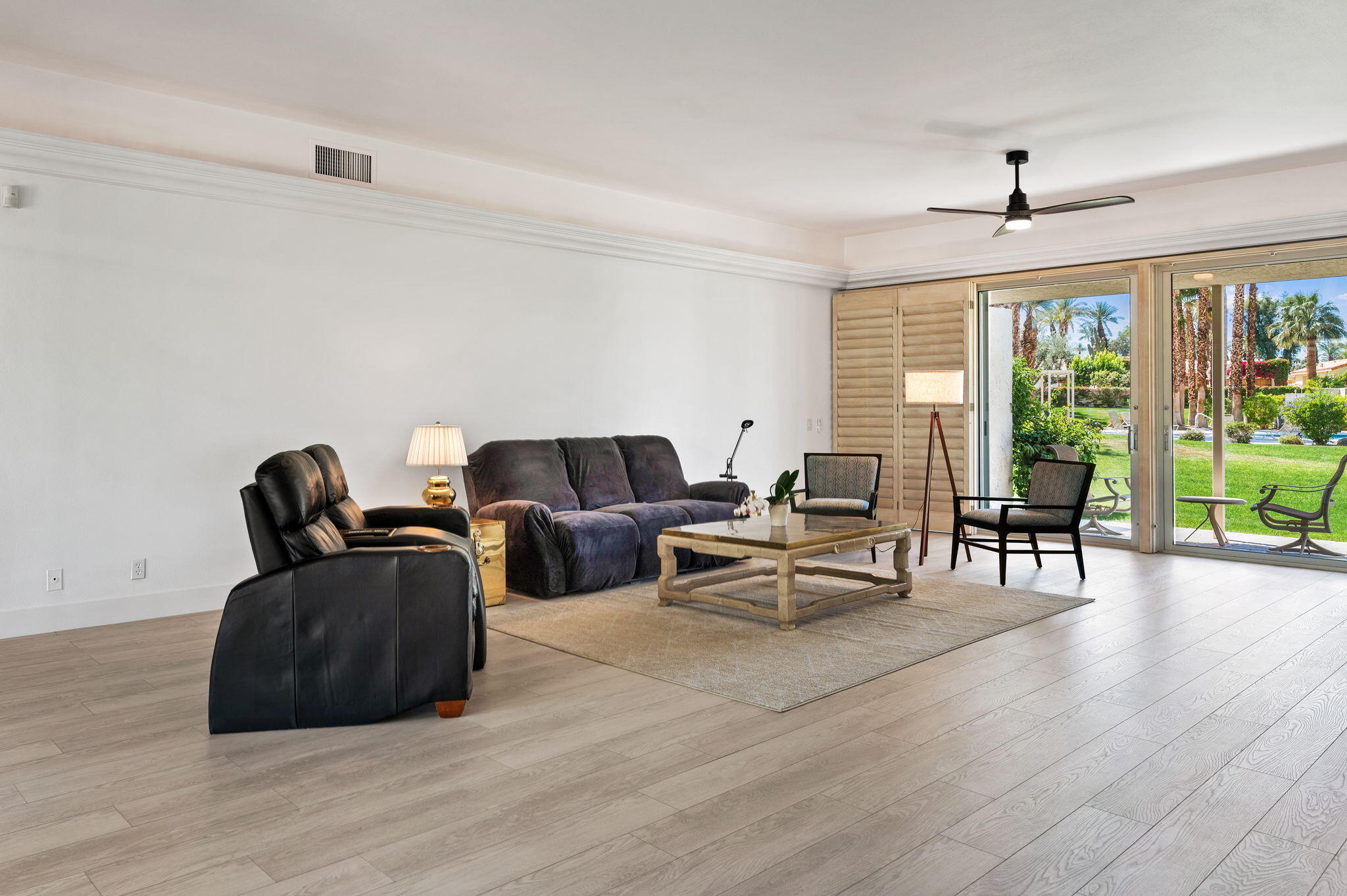 45835 Pawnee Road Indian Wells, CA 92210 - Photo 11 of 46 a living room with furniture and a wooden floor