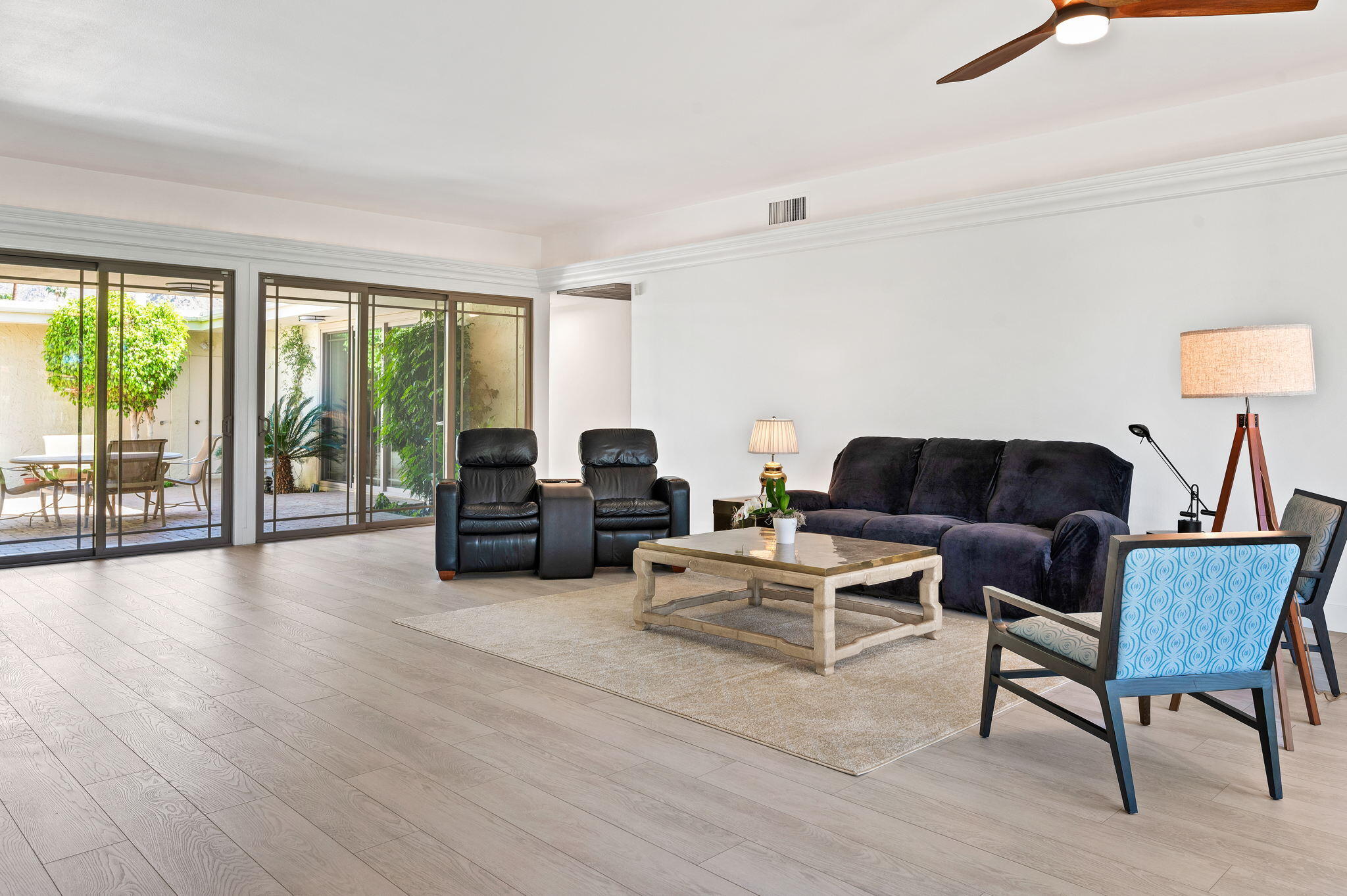 45835 Pawnee Road Indian Wells, CA 92210 - Photo 12 of 46 a living room with furniture and a wooden floor