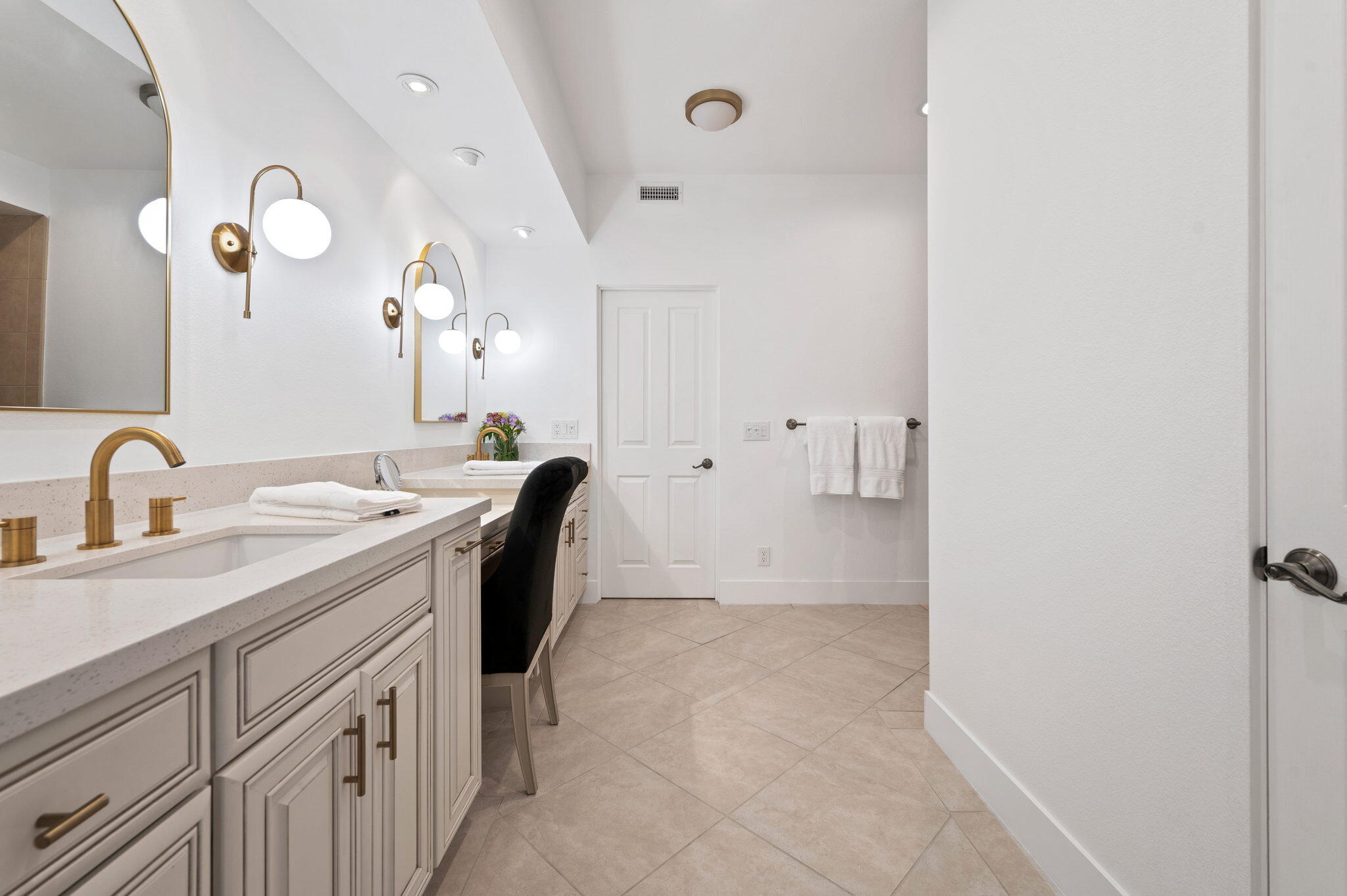45835 Pawnee Road Indian Wells, CA 92210 - Photo 21 of 46 a spacious bathroom with a double vanity sink a mirror and a shower