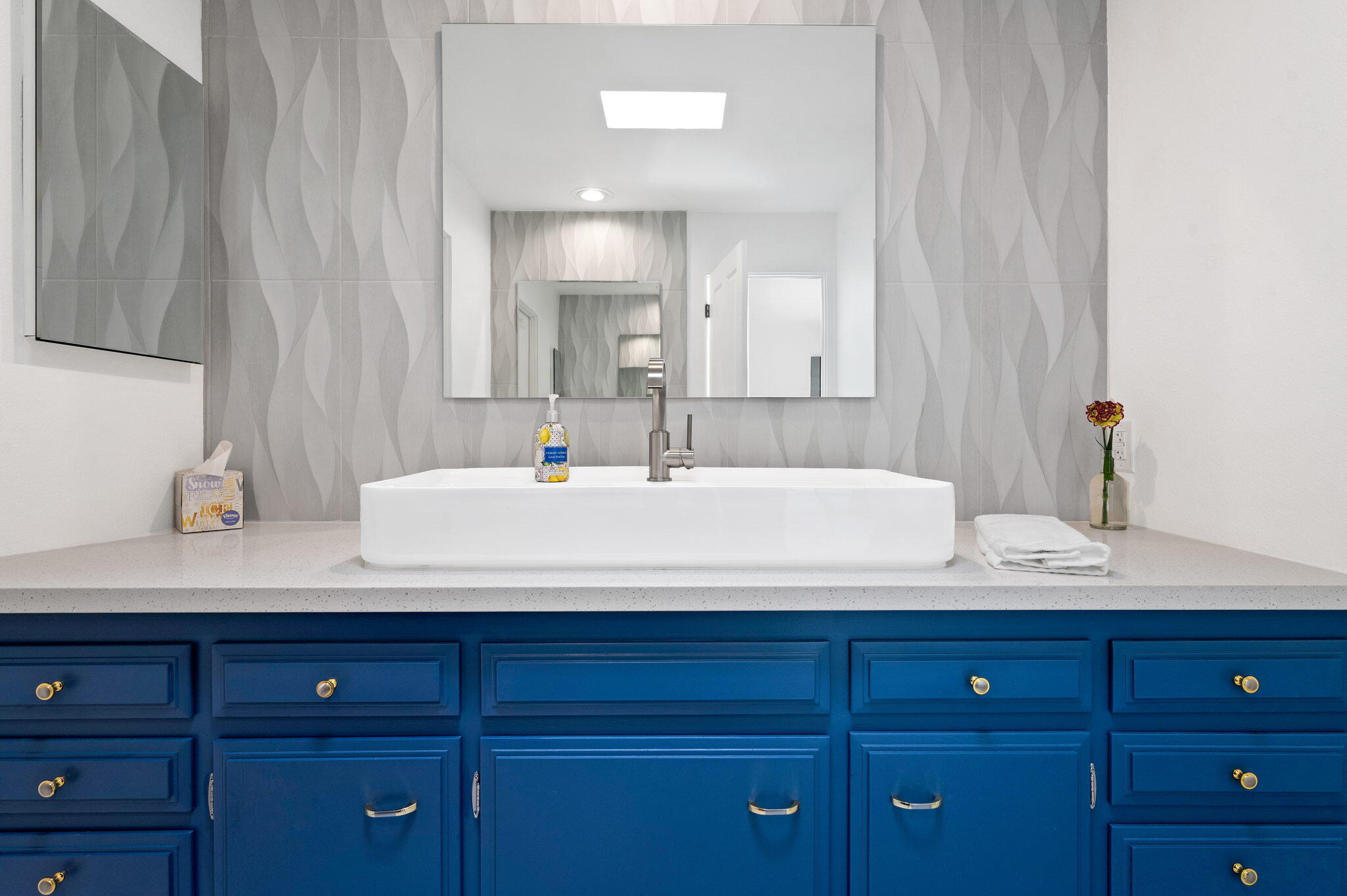 45835 Pawnee Road Indian Wells, CA 92210 - Photo 29 of 46 a bathroom with a granite countertop sink and a mirror