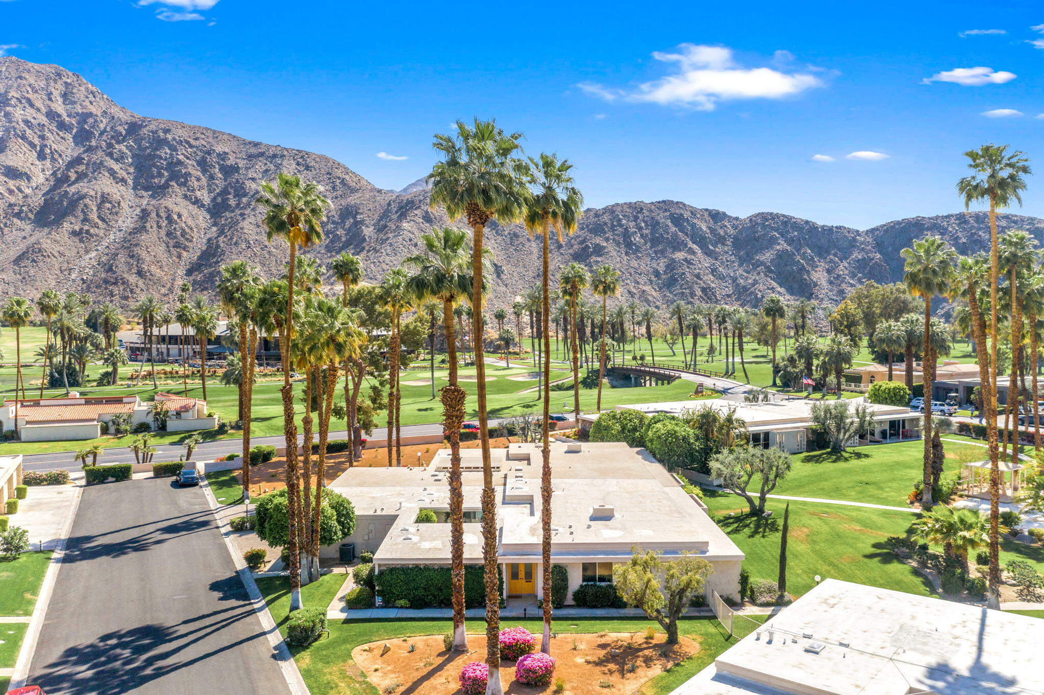 45835 Pawnee Road Indian Wells, CA 92210 - Photo 4 of 46 a view of a city with tall buildings