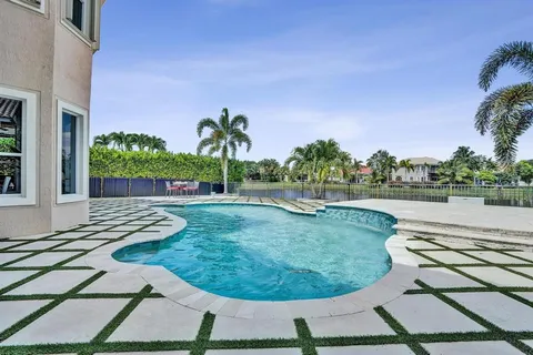 a view of a chairs and tables in the patio