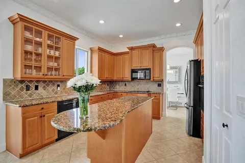 a view of a porch with furniture and a window