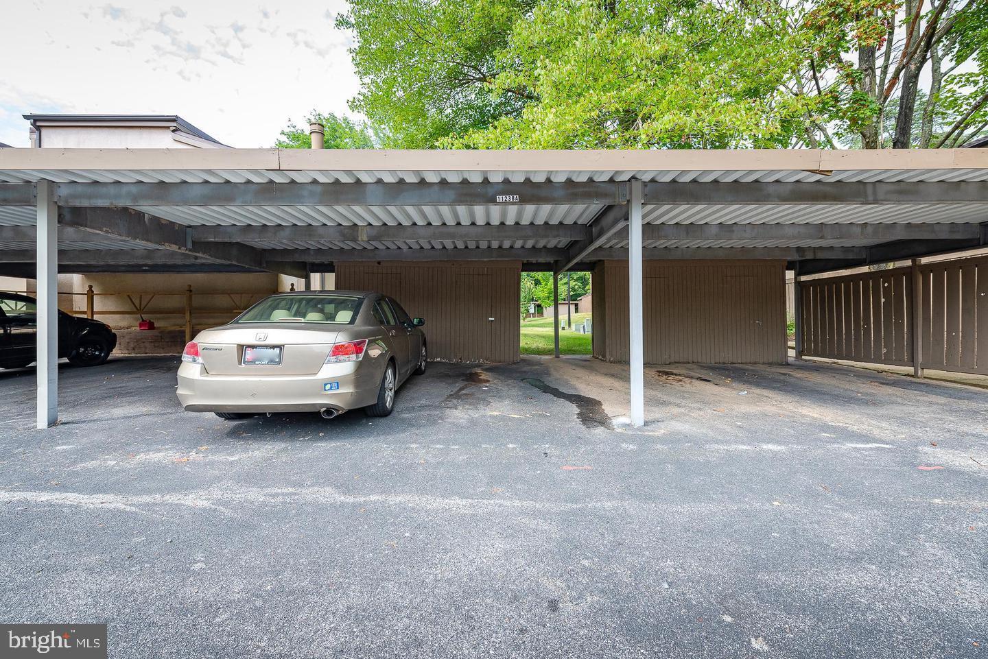 11238 Crystal Run, Unit A Columbia, MD 21044 - Photo 22 of 33 Private carport w/ storage shed