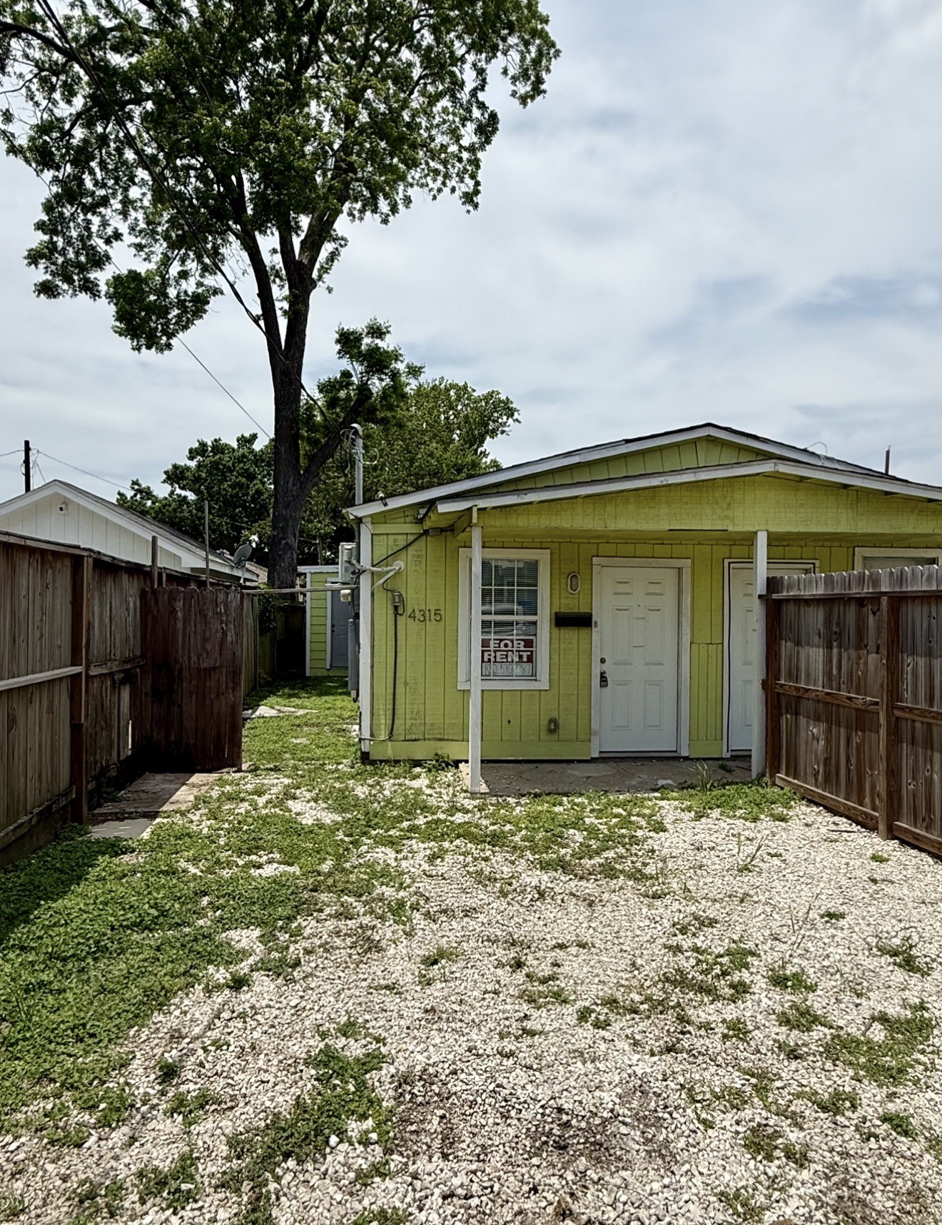 4315 Chapman Street Houston, TX 77009 - Photo 1 of 12 a front view of a house with a yard