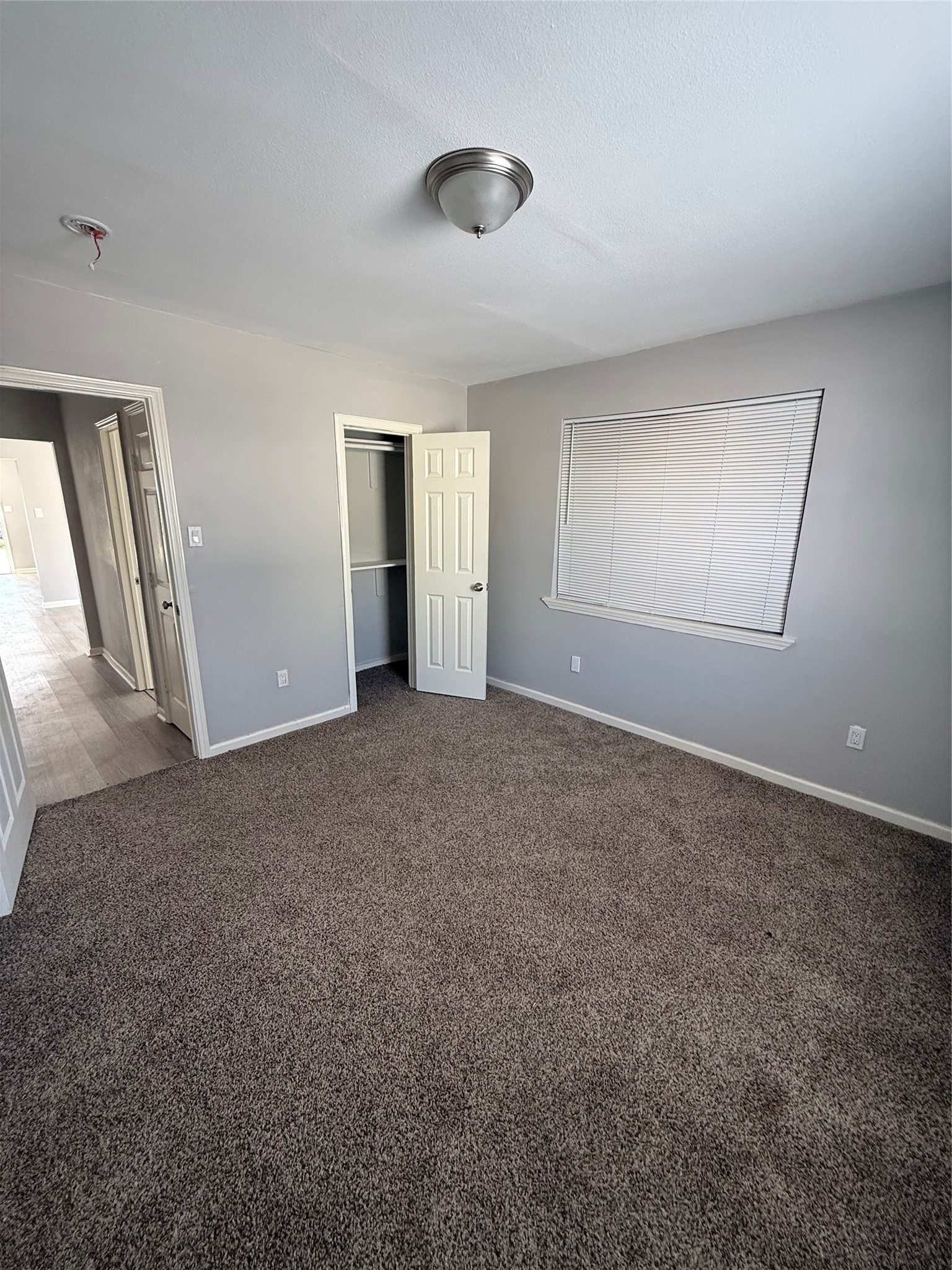 4315 Chapman Street Houston, TX 77009 - Photo 12 of 12 an empty room with a natural light