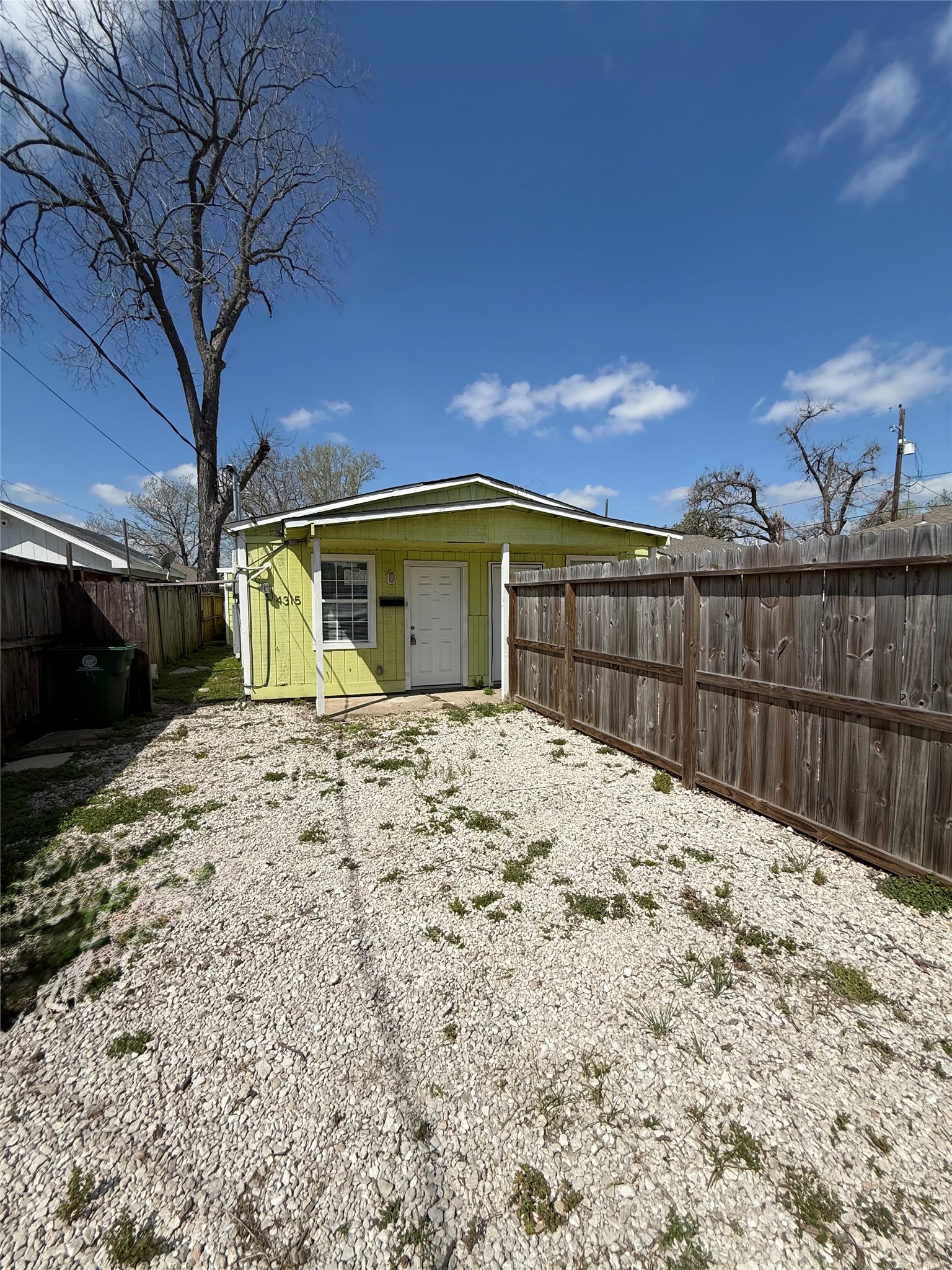 4315 Chapman Street Houston, TX 77009 - Photo 2 of 12 a view of a backyard of the house