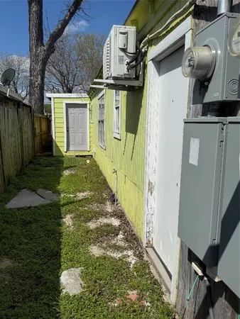 a house view with a backyard space