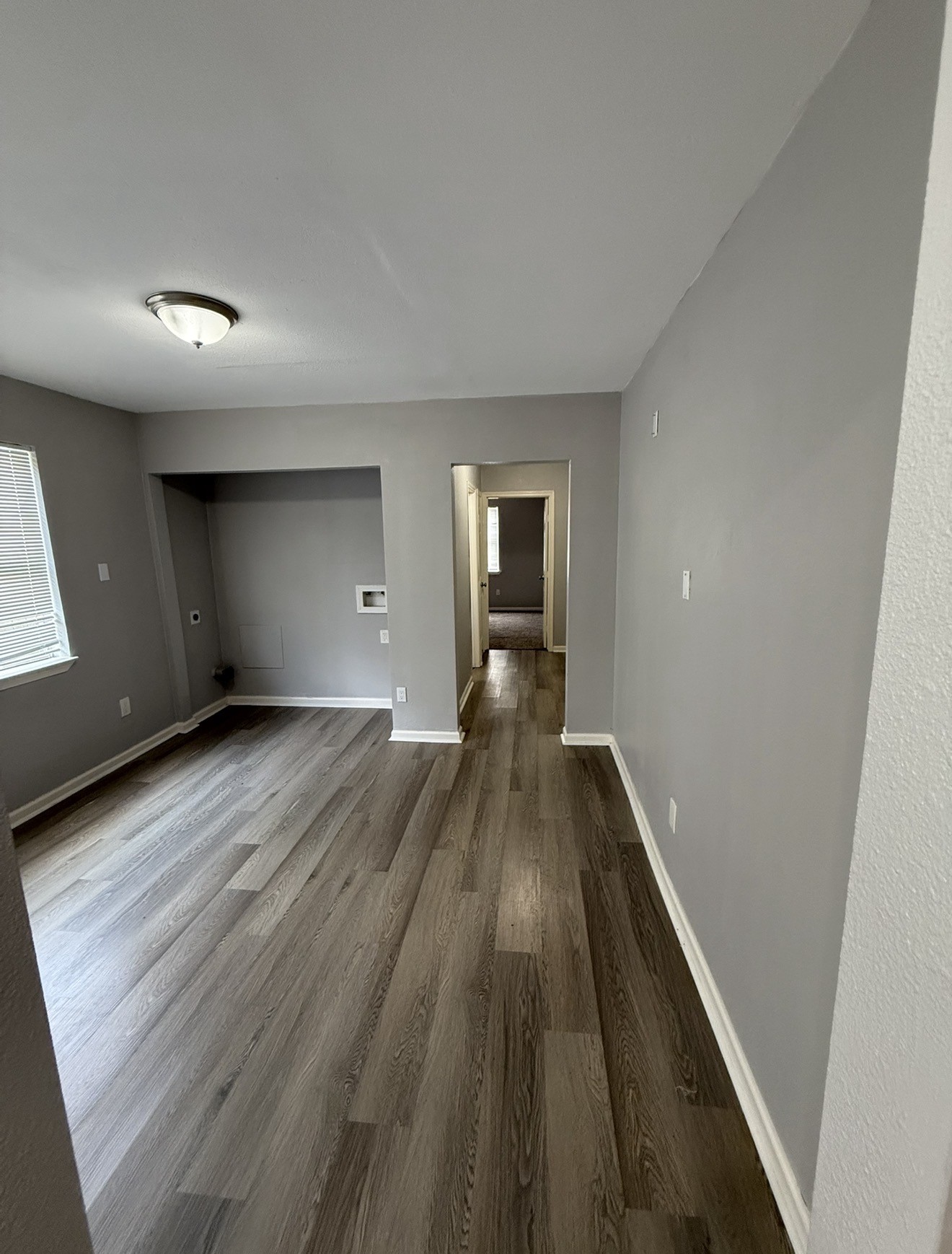 4315 Chapman Street Houston, TX 77009 - Photo 7 of 12 a view of empty room with wooden floor