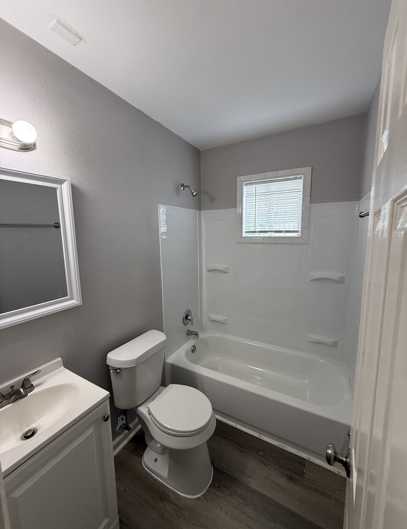 4315 Chapman Street Houston, TX 77009 - Photo 10 of 12 a bathroom with a toilet sink and shower
