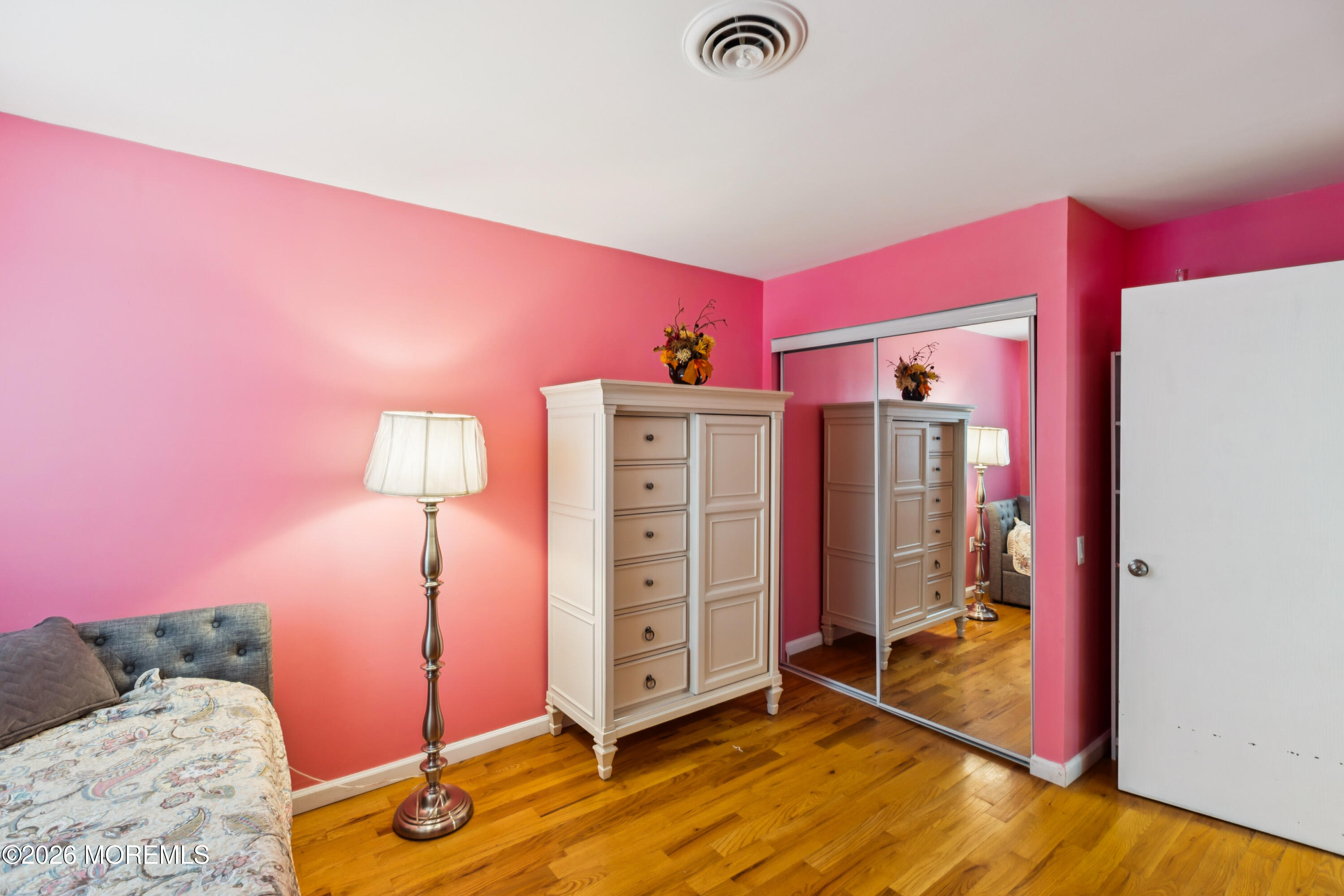 65 A Sunset Road, Unit 60 Whiting, NJ 08759 - Photo 15 of 24 a view of a livingroom with a bed and a dresser