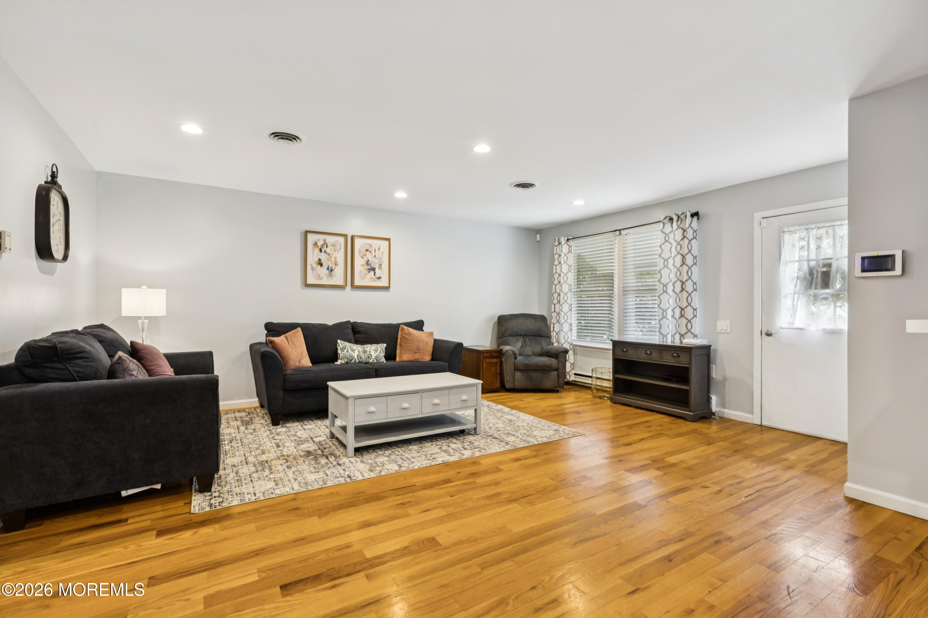 65 A Sunset Road, Unit 60 Whiting, NJ 08759 - Photo 6 of 24 a living room with furniture and a table