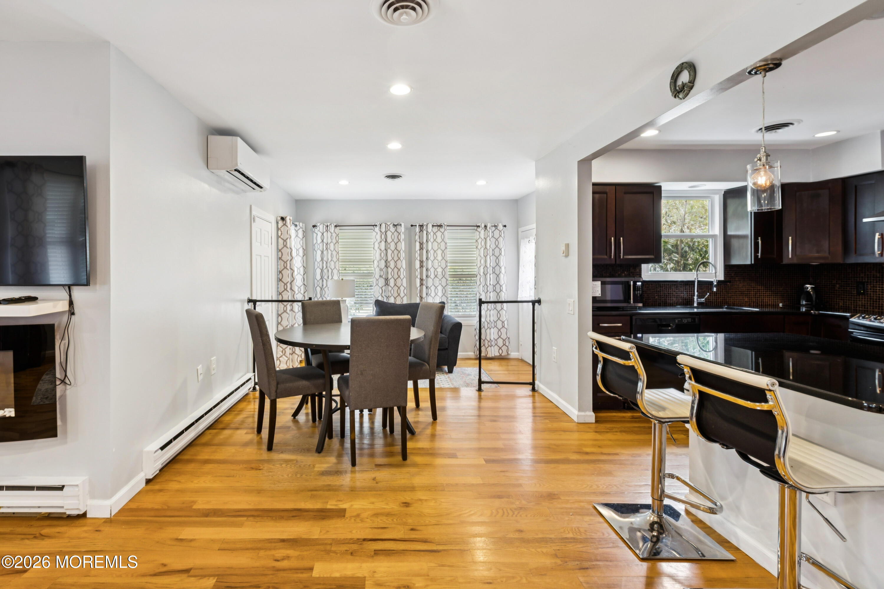 65 A Sunset Road, Unit 60 Whiting, NJ 08759 - Photo 9 of 24 a view of a dining room with furniture