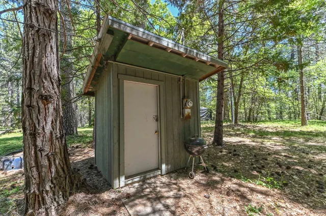 a backyard of a house with lots of green space