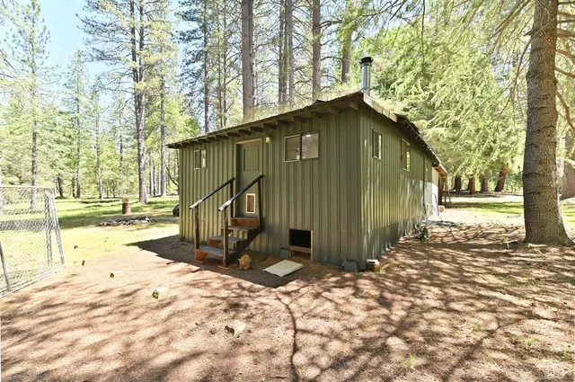 a house with trees in front of it