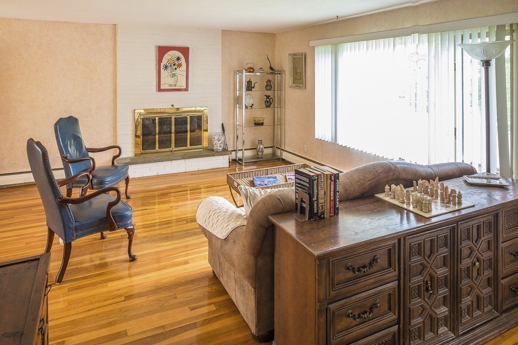 18 Jane Road Marblehead, MA 01945 - Photo 12 of 26 a living room with furniture and a large window