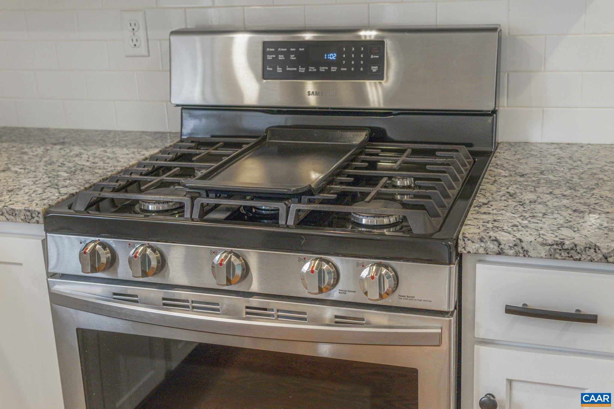 4053 Free Union Road Charlottesville, VA 22901 - Photo 19 of 67 a close view of stove top oven