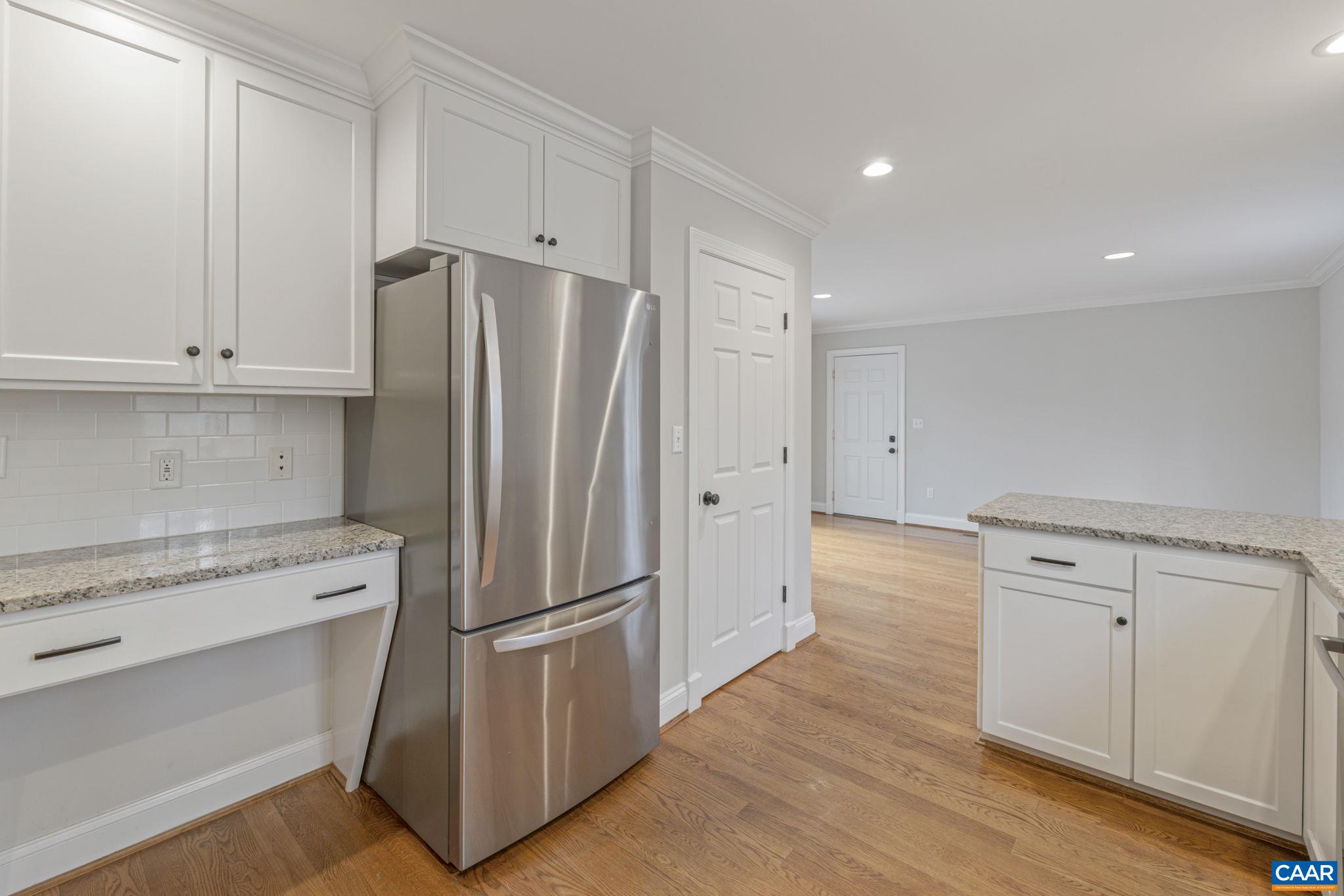 4053 Free Union Road Charlottesville, VA 22901 - Photo 23 of 67 a kitchen with a refrigerator and a stove top oven