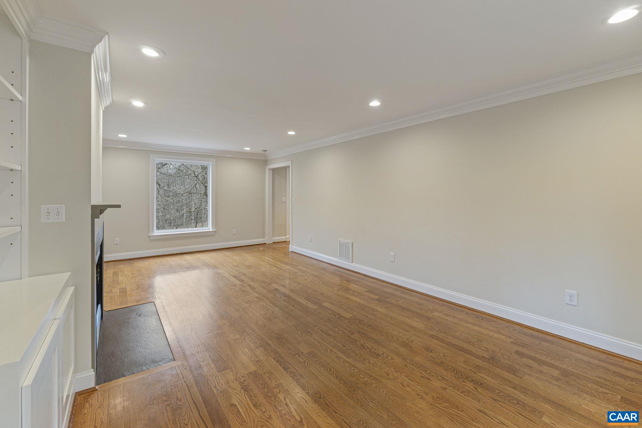 4053 Free Union Road Charlottesville, VA 22901 - Photo 29 of 67 wooden floor in an empty room with a window