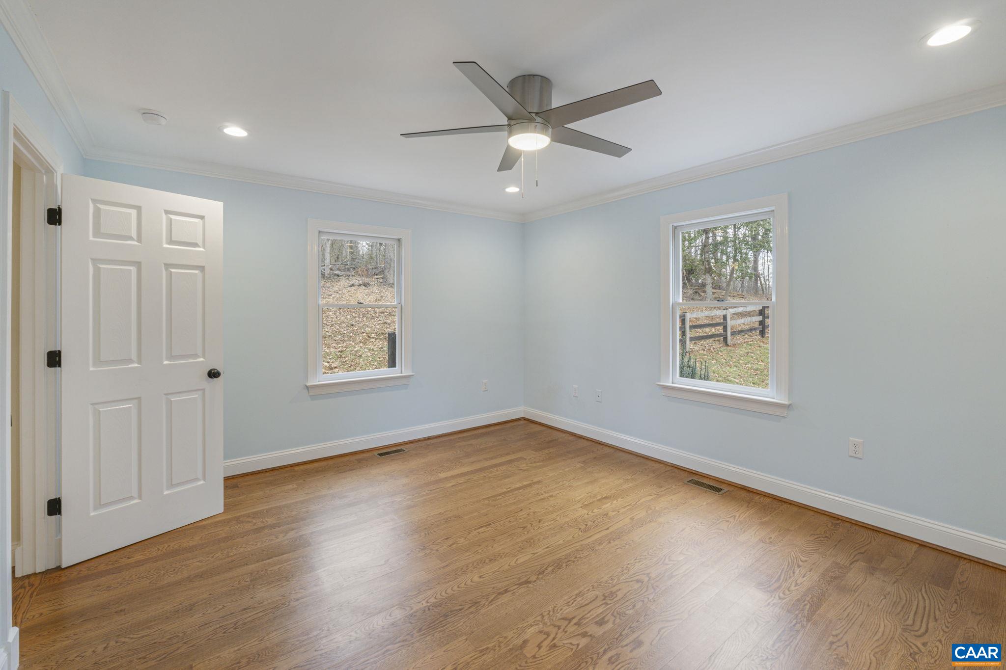4053 Free Union Road Charlottesville, VA 22901 - Photo 33 of 67 wooden floor in an empty room with a window