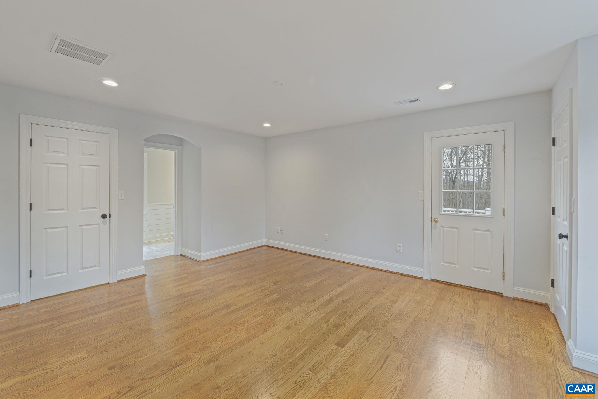 4053 Free Union Road Charlottesville, VA 22901 - Photo 42 of 67 a view of an empty room with wooden floor