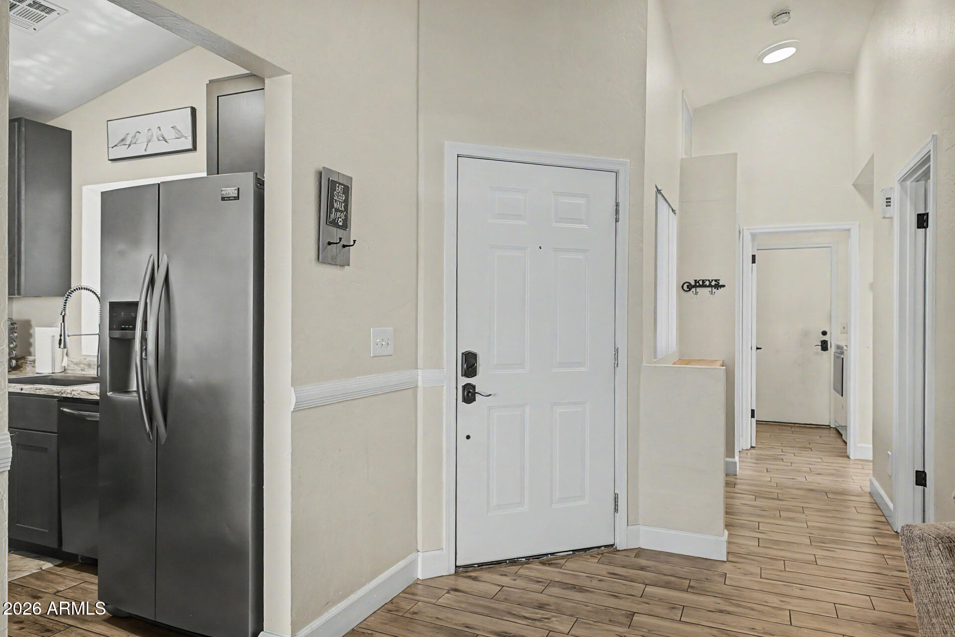 4725 East Brown Road, Unit 70 Mesa, AZ 85205 - Photo 12 of 25 a view of a bedroom from the hallway