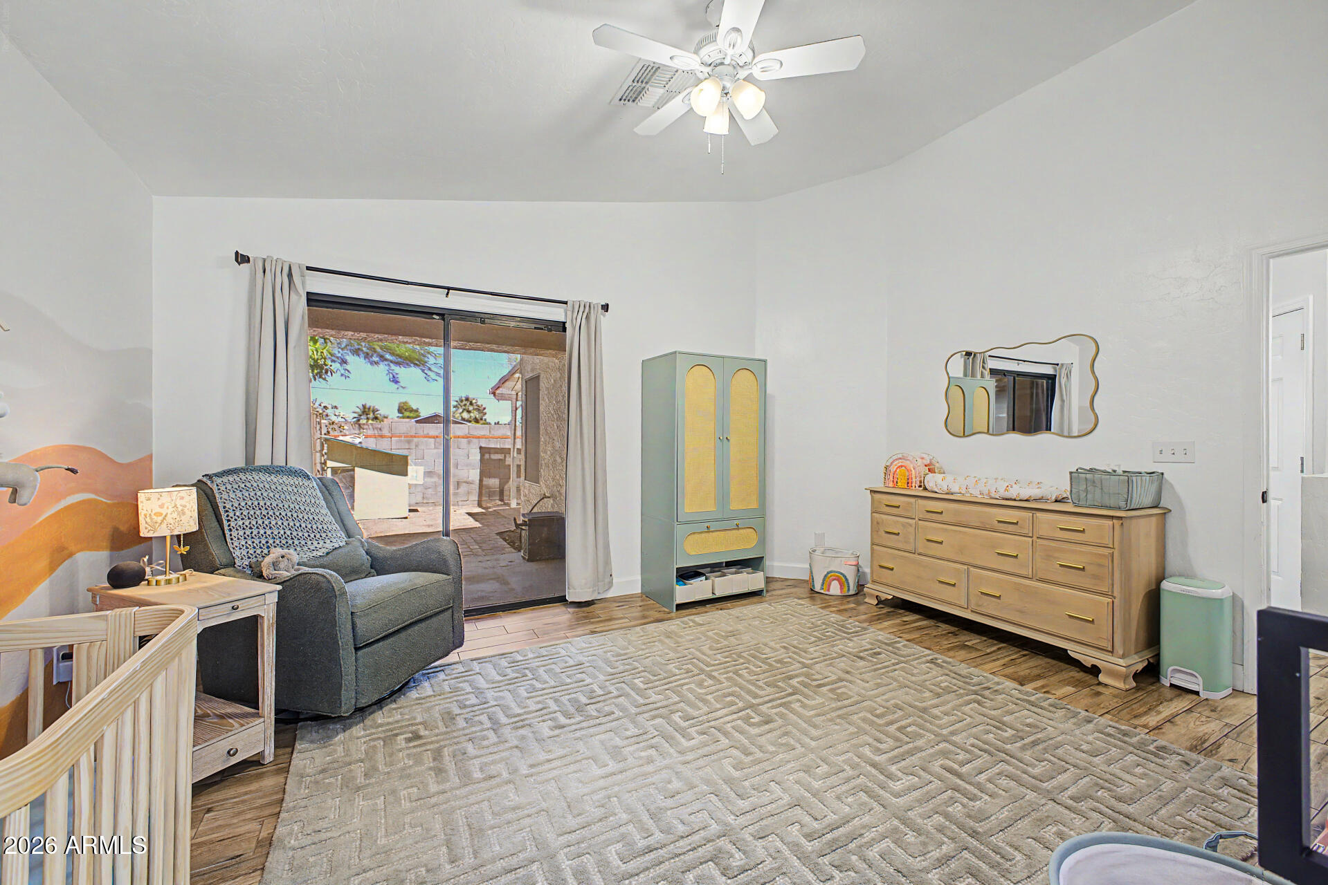 4725 East Brown Road, Unit 70 Mesa, AZ 85205 - Photo 18 of 25 a bedroom with furniture and a window