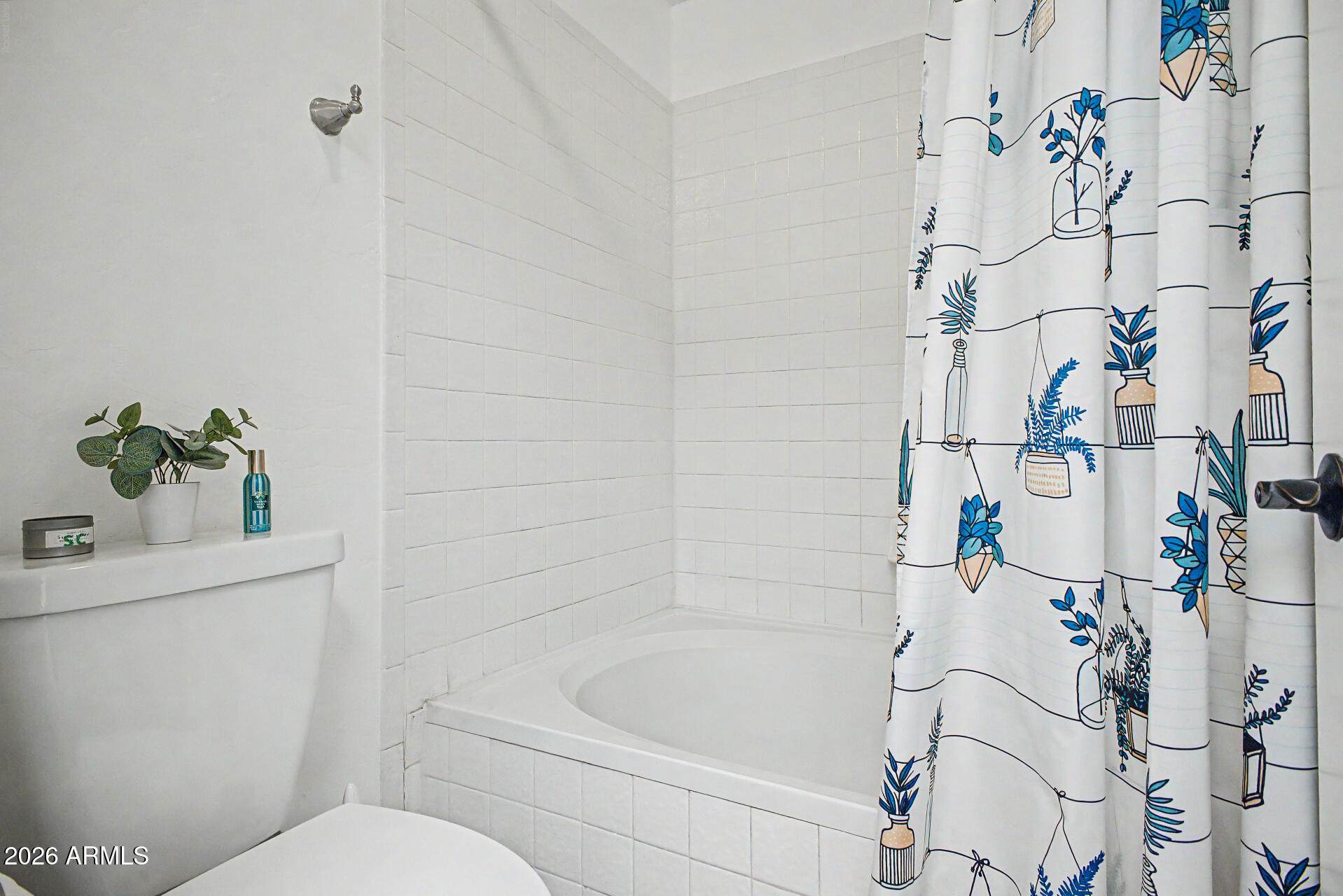 4725 East Brown Road, Unit 70 Mesa, AZ 85205 - Photo 22 of 25 a bathroom with a bathtub and shower