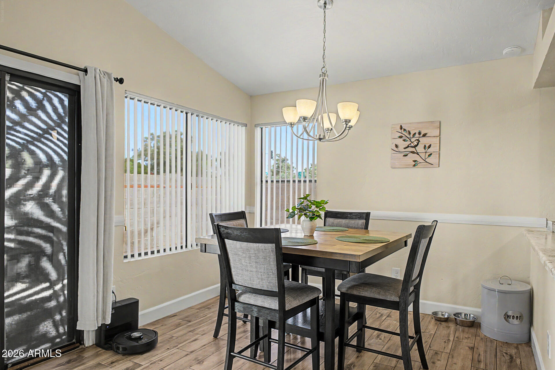 4725 East Brown Road, Unit 70 Mesa, AZ 85205 - Photo 8 of 25 a view of a dining room with furniture window and outside view